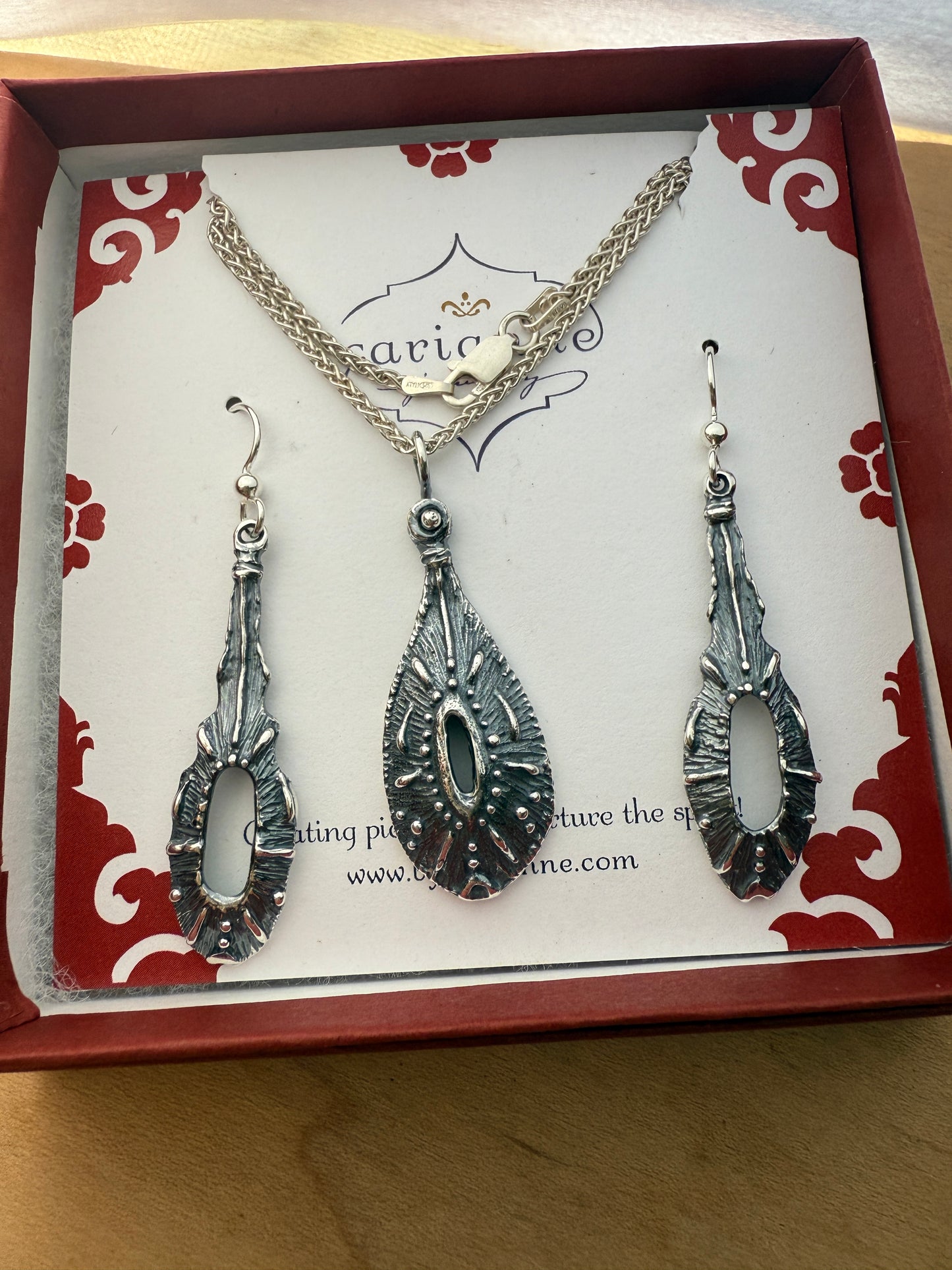 Custom Ancient abstract pendant and earrings