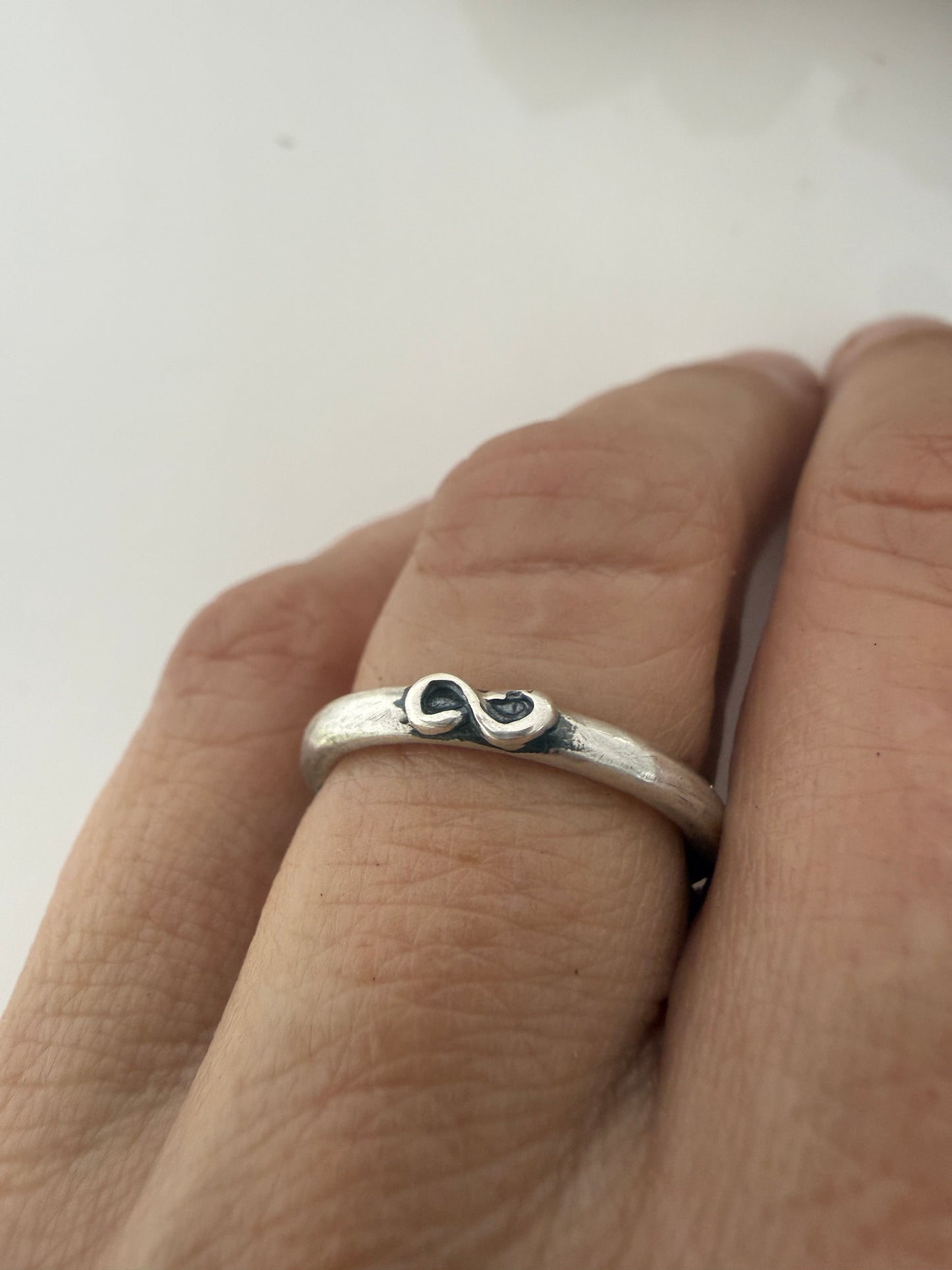 Simple sterling silver, round wire ring- Tiny Infinity